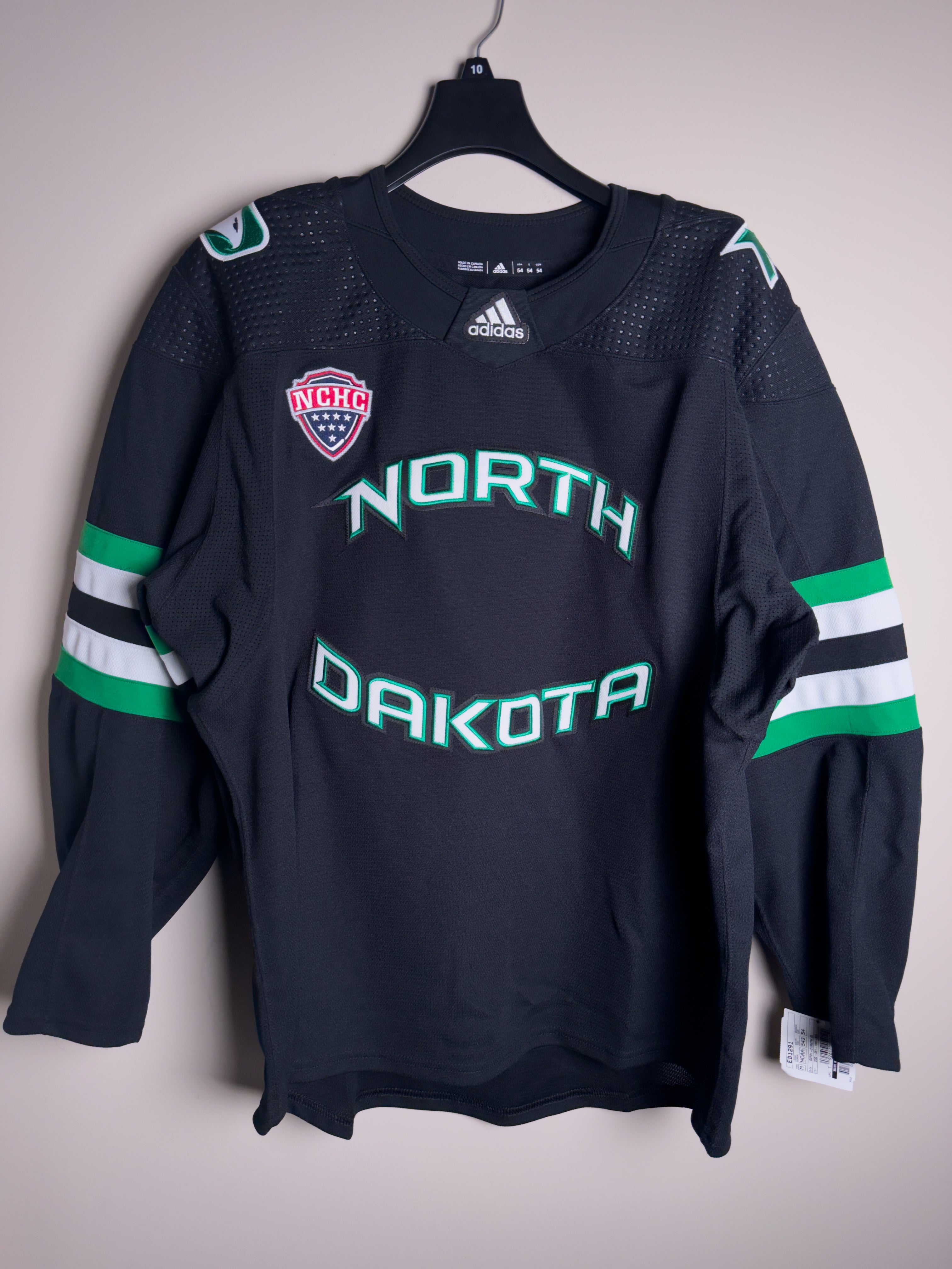 North Dakota Fighting Hawks Adidas MiC Team Issued Jersey Size 54 (Player Size)